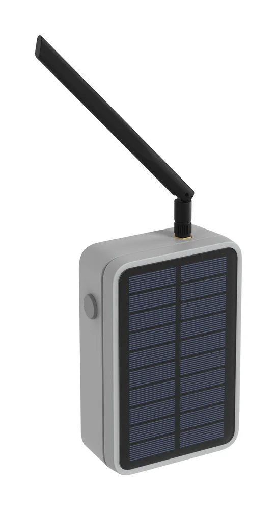 A Minnesota Mesh node: a small grey weatherproof box with a solar panel on the front and a short black antenna on top.